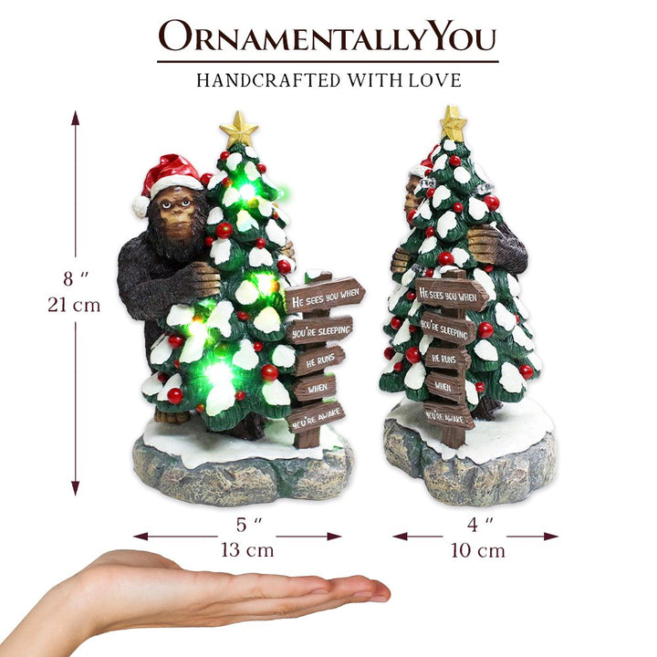 (Pre-Order) Whimsical Bigfoot Behind Christmas Tree Figurine, 7.5" Funny Holiday Yeti LED Statue, He Sees You When You're Sleeping Resin Statues OrnamentallyYou