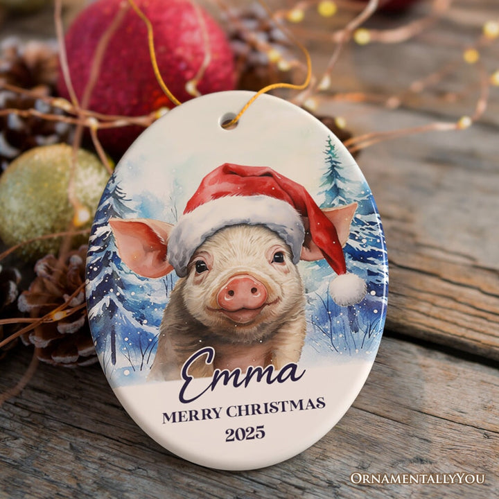 Pig with Santa Hat Personalized Ornament, Winter Forest Christmas Gift With Custom Name and Date Ceramic Ornament OrnamentallyYou Oval