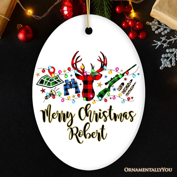 Personalized Buffalo Plaid Hunting Theme Christmas Ornament, Hunter Gift, Red and Green Deer and Gun Ceramic Ornament OrnamentallyYou Oval