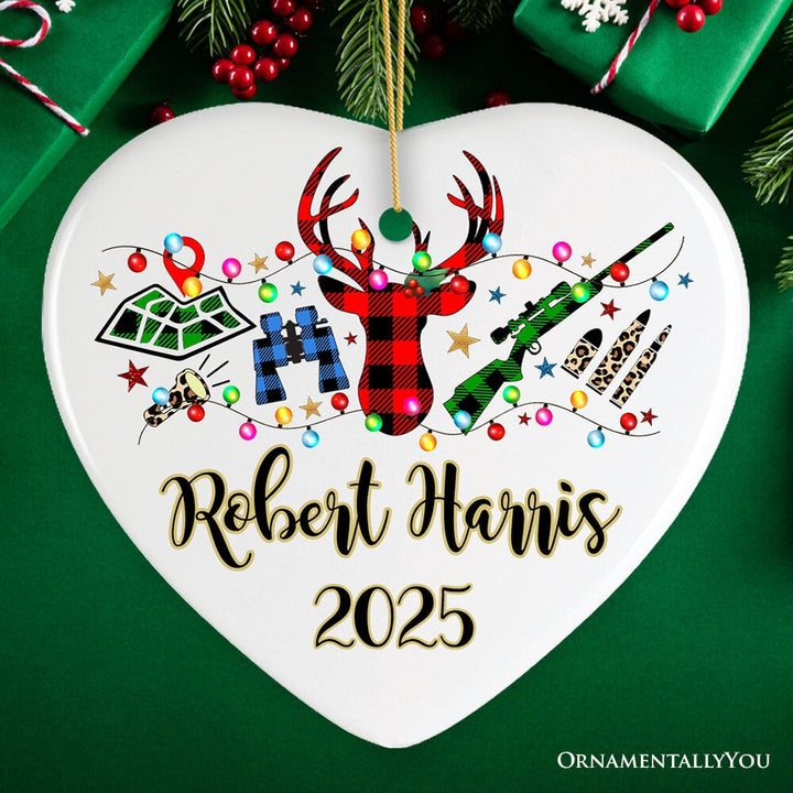 Personalized Buffalo Plaid Hunting Theme Christmas Ornament, Hunter Gift, Red and Green Deer and Gun Ceramic Ornament OrnamentallyYou Heart