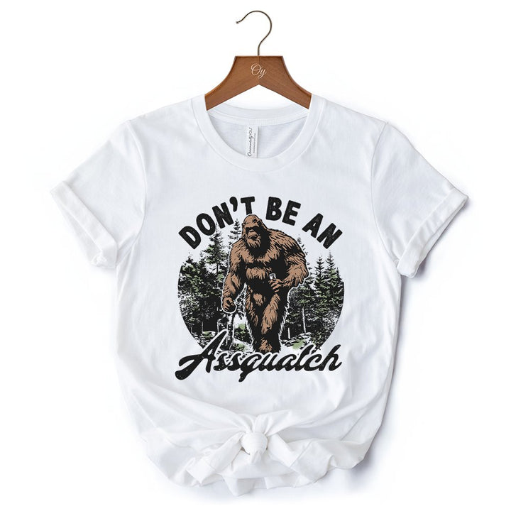 Don't Be a Sasquatch Funny T-Shirt, Retro Bigfoot White and Natural Tee for Outdoor and Camping Dads T-Shirts OrnamentallyYou