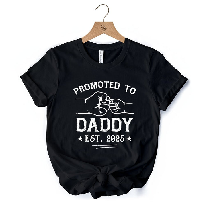 Promoted to Daddy Est. 2025 T-Shirt, Black and White New Dad Pregnancy Announcement Tee T-Shirts OrnamentallyYou