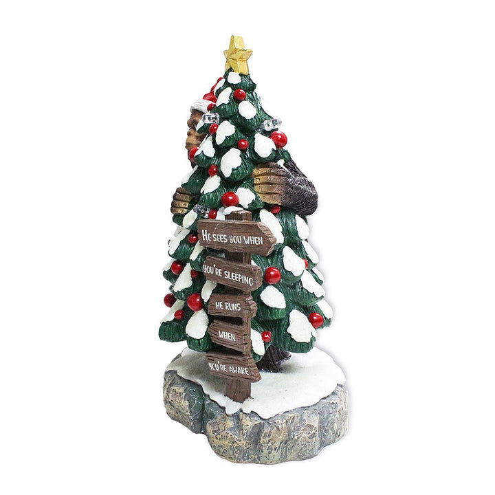 (Pre-Order) Whimsical Bigfoot Behind Christmas Tree Figurine, 7.5" Funny Holiday Yeti LED Statue, He Sees You When You're Sleeping Resin Statues OrnamentallyYou