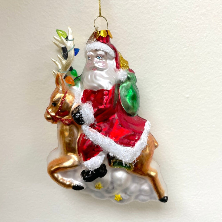 Santa Riding Reindeer Glass Christmas Ornament Glass Ornament OrnamentallyYou