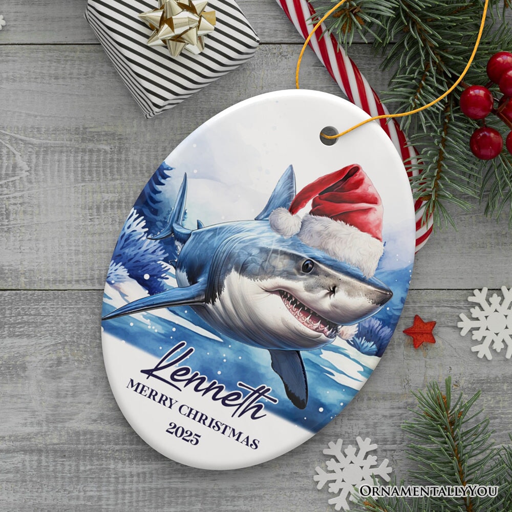 Shark with Santa Hat Personalized Ornament, Festive Christmas Gift With Custom Name and Date Ceramic Ornament OrnamentallyYou Oval 