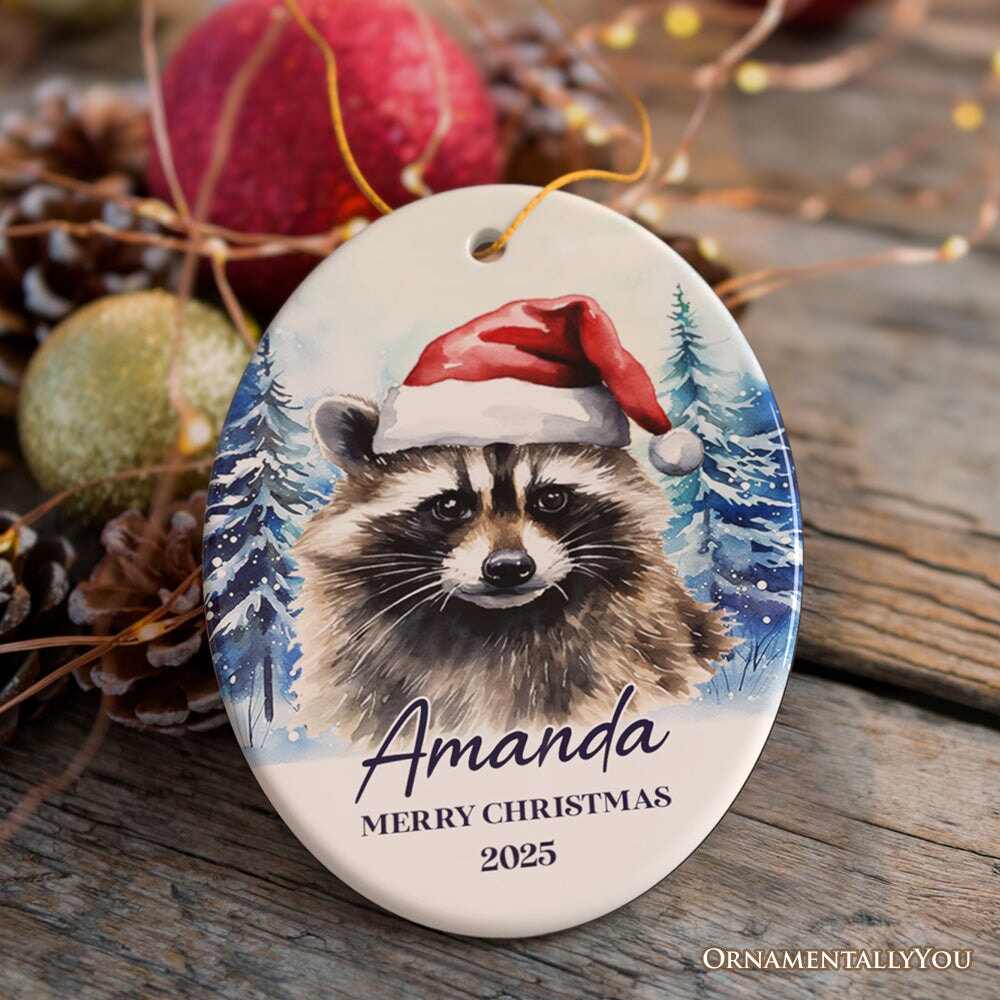 Raccoon with Santa Hat Personalized Ornament, Winter Forest Christmas Gift With Custom Name and Date Ceramic Ornament OrnamentallyYou Oval 