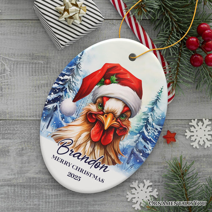 Rooster with Santa Hat Personalized Ornament Winter Forest Christmas Gift With Custom Name and Date Ceramic Ornament OrnamentallyYou Oval 