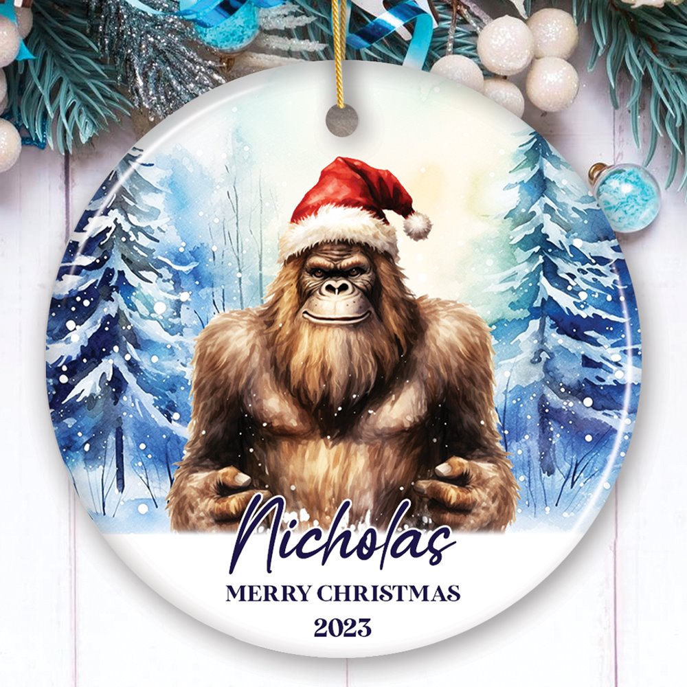 Bigfoot with Santa Hat Personalized Ornament, Winter Forest Christmas Gift With Custom Name and Date Ceramic Ornament OrnamentallyYou Circle 