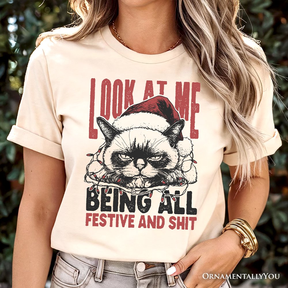 Grumpy Christmas Cat T‑Shirt, Funny Santa Hat Holiday Lights Tee for Sarcastic Festive People T-Shirts OrnamentallyYou 