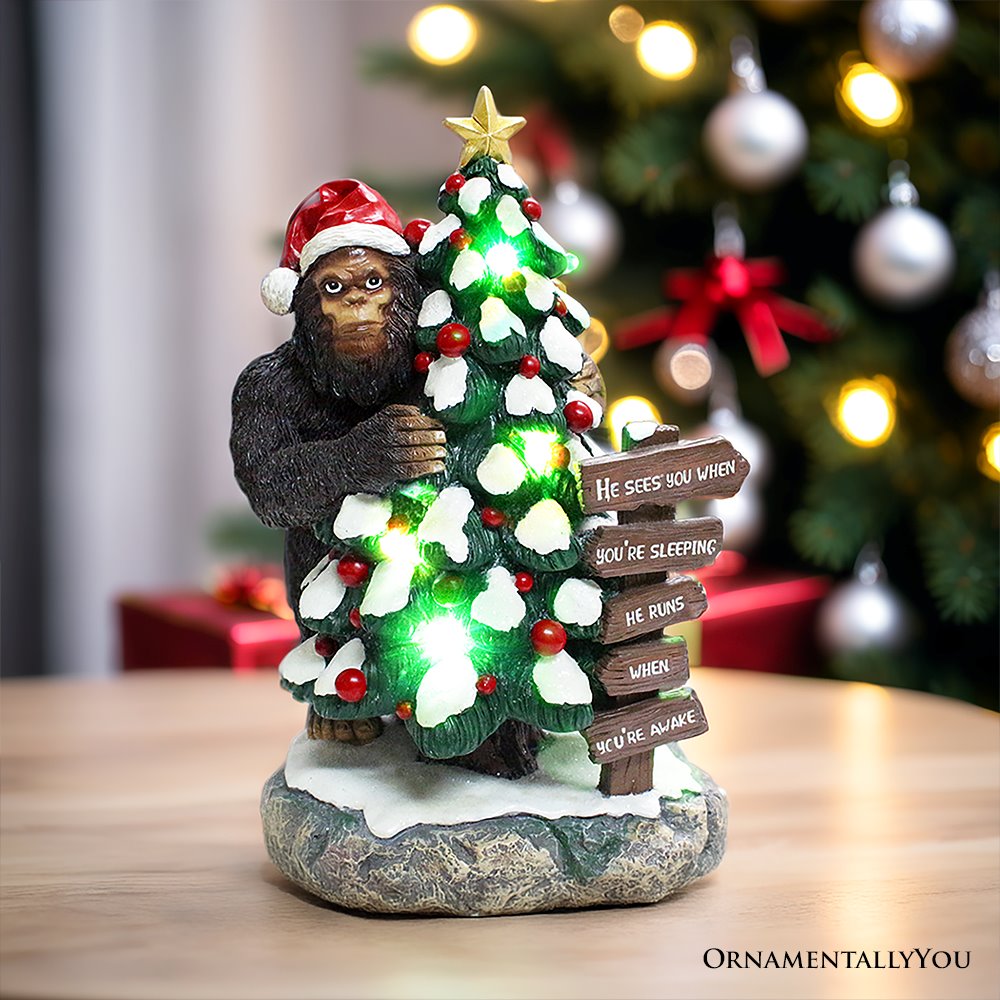 (Pre-Order) Whimsical Bigfoot Behind Christmas Tree Figurine, 7.5" Funny Holiday Yeti LED Statue, He Sees You When You're Sleeping Resin Statues OrnamentallyYou 