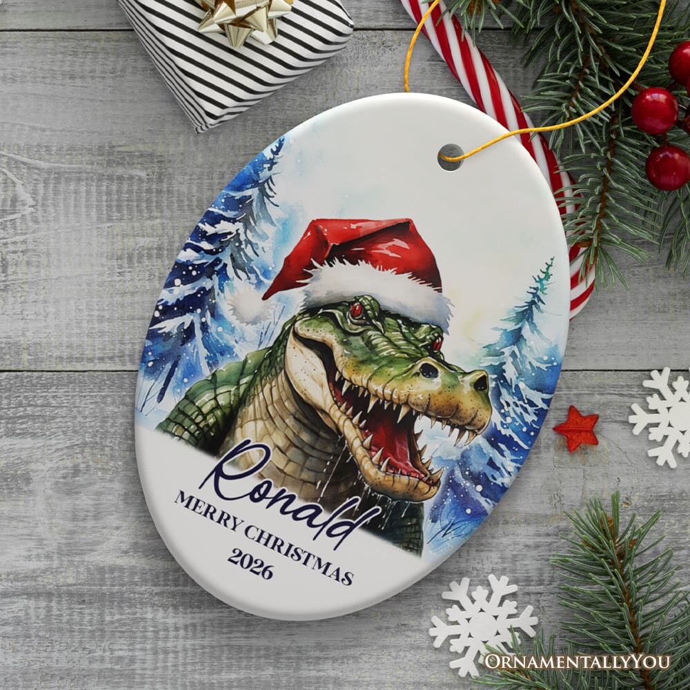 Alligator with Santa Hat Personalized Ornament, Winter Forest Christmas Gift With Custom Name and Date Ceramic Ornament OrnamentallyYou Oval 