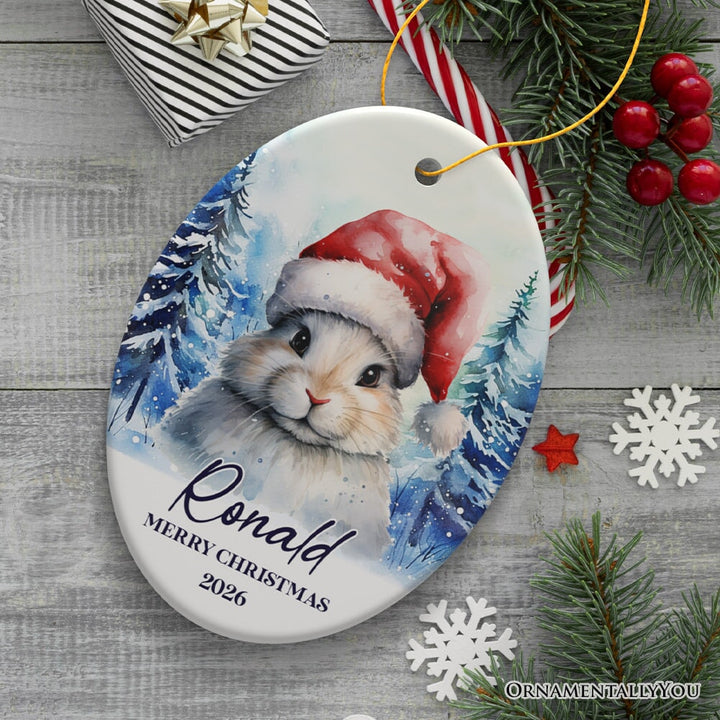 Cute Bunny with Santa Hat Personalized Ornament, Winter Forest Christmas Gift With Custom Name and Date Ceramic Ornament OrnamentallyYou Oval 