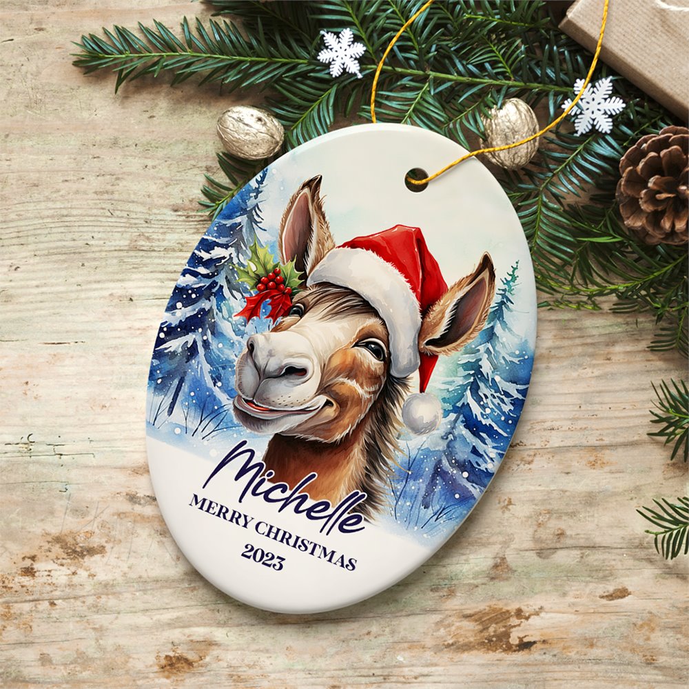 Donkey with Santa Hat Personalized Ornament, Winter Forest Christmas Gift With Custom Name and Date Ceramic Ornament OrnamentallyYou Oval 