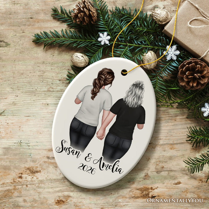 Gay Pride Women Couple with Rainbow Flag Personalized Christmas Ornament, LGBT and Lesbian Activism Ceramic Ornament OrnamentallyYou Oval 