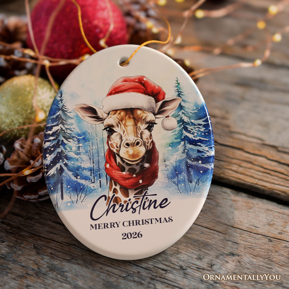 Giraffe with Santa Hat Personalized Ornament, Winter Forest Christmas Gift With Custom Name and Date Ceramic Ornament OrnamentallyYou Oval 