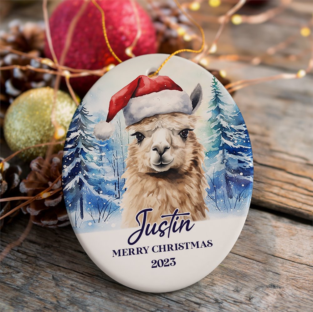 Llama with Santa Hat Personalized Ornament, Winter Forest Christmas Gift With Custom Name and Date Ceramic Ornament OrnamentallyYou Oval 