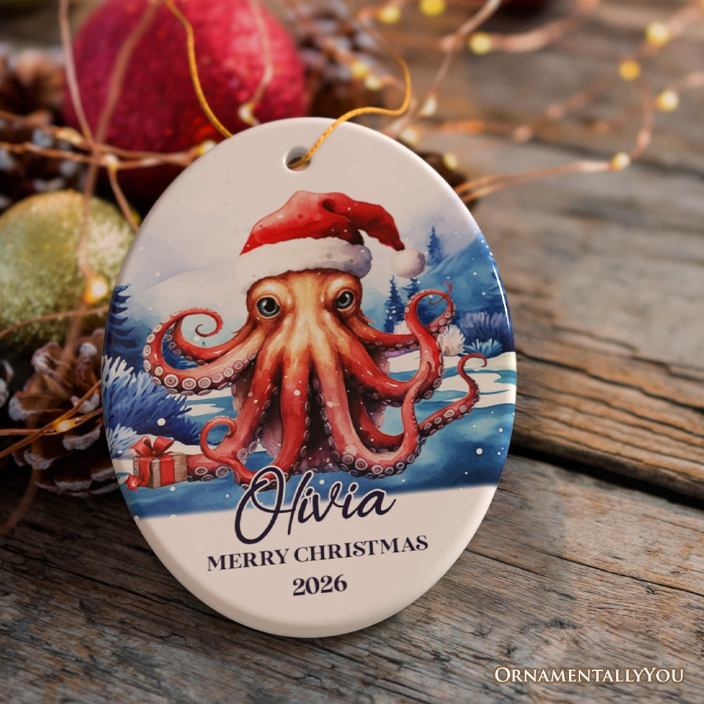 Octopus with Santa Hat Personalized Ornament, Festive Christmas Gift With Custom Name and Date Ceramic Ornament OrnamentallyYou Oval 