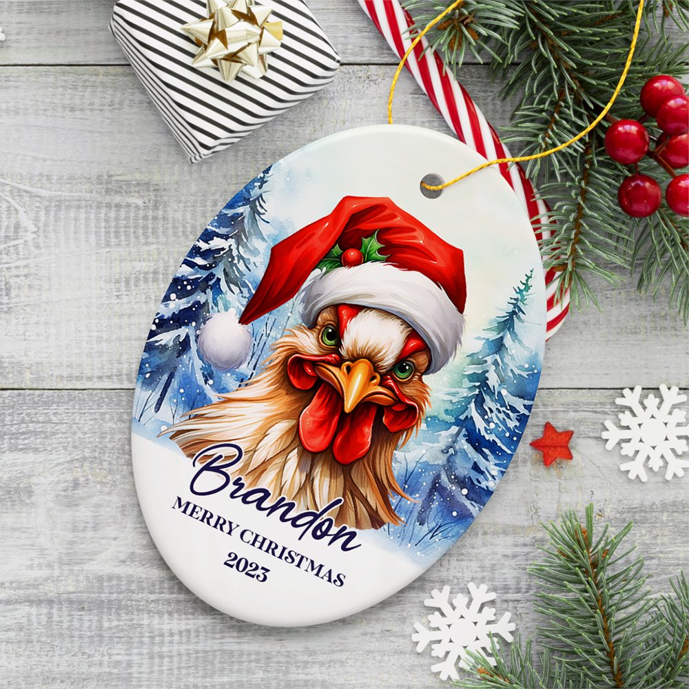 Rooster with Santa Hat Personalized Ornament Winter Forest Christmas Gift With Custom Name and Date Ceramic Ornament OrnamentallyYou Oval 