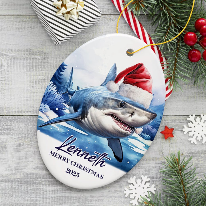 Shark with Santa Hat Personalized Ornament, Festive Christmas Gift With Custom Name and Date Ceramic Ornament OrnamentallyYou Oval 