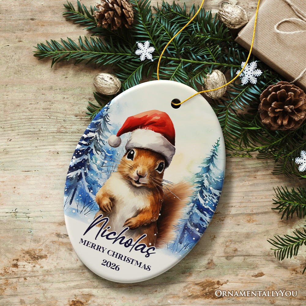 Squirrel with Santa Hat Personalized Ornament, Winter Forest Christmas Gift With Custom Name and Date Ceramic Ornament OrnamentallyYou Oval 