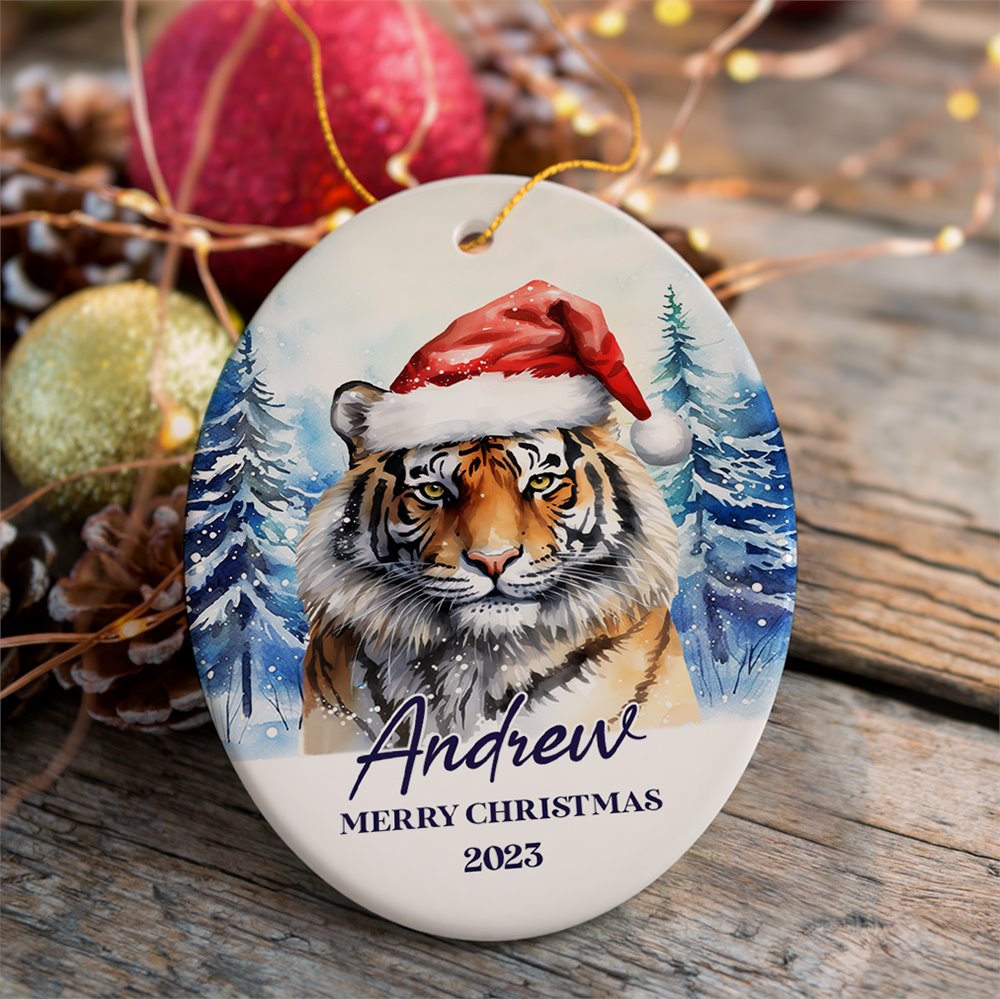 Tiger with Santa Hat Personalized Ornament, Winter Forest Christmas Gift With Custom Name and Date Ceramic Ornament OrnamentallyYou Oval 