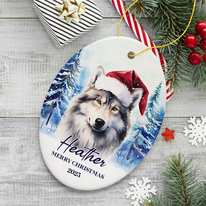 Wolf with Santa Hat Personalized Ornament, Winter Forest Christmas Gift With Custom Name and Date Ceramic Ornament OrnamentallyYou Oval 