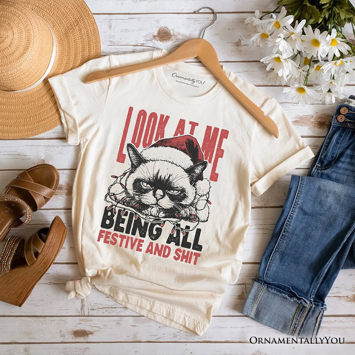 Grumpy Christmas Cat T‑Shirt, Funny Santa Hat Holiday Lights Tee for Sarcastic Festive People T-Shirts OrnamentallyYou Natural XS 