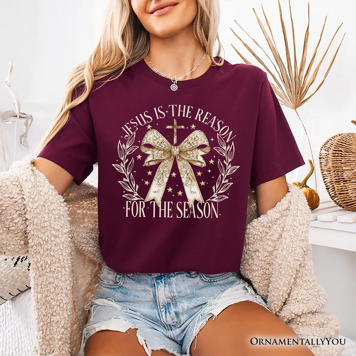 Jesus Is the Reason Christmas T‑Shirt, Coquette Gold Bow Cross Tee for Faithful Women