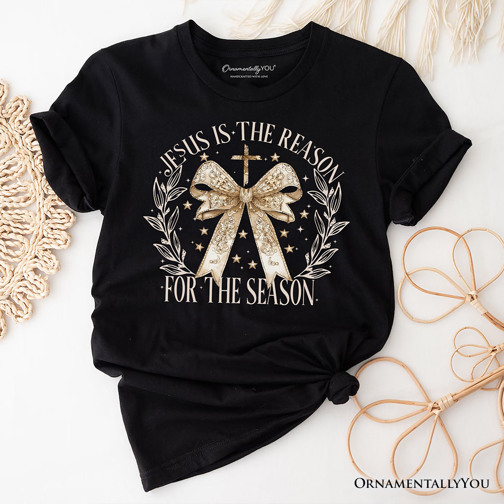 Jesus Is the Reason Christmas T‑Shirt, Coquette Gold Bow Cross Tee for Faithful Women