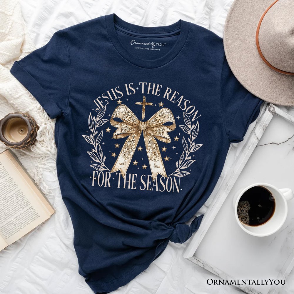Jesus Is the Reason Christmas T‑Shirt, Coquette Gold Bow Cross Tee for Faithful Women T-Shirts OrnamentallyYou 