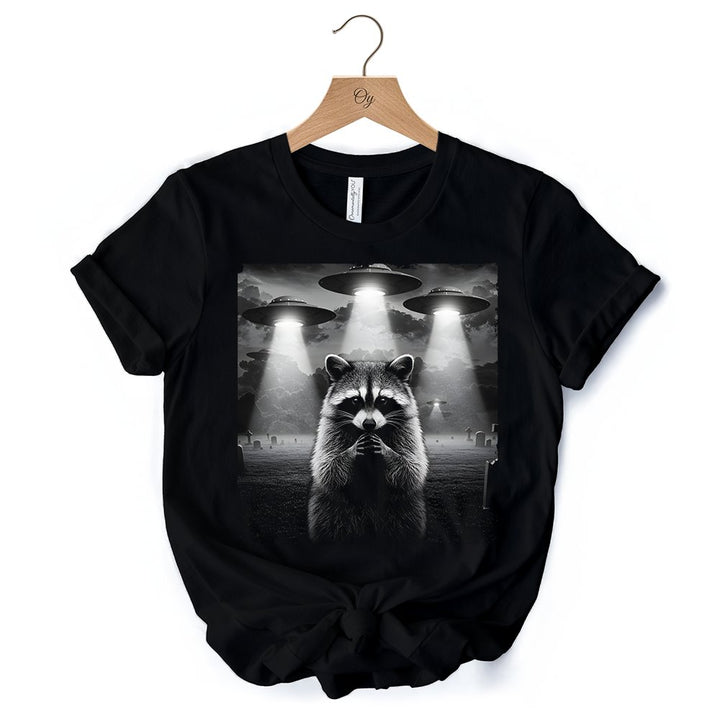 Funny Raccoon UFO T-Shirt, Unisex Black Tee for Space Lover T-Shirts OrnamentallyYou 