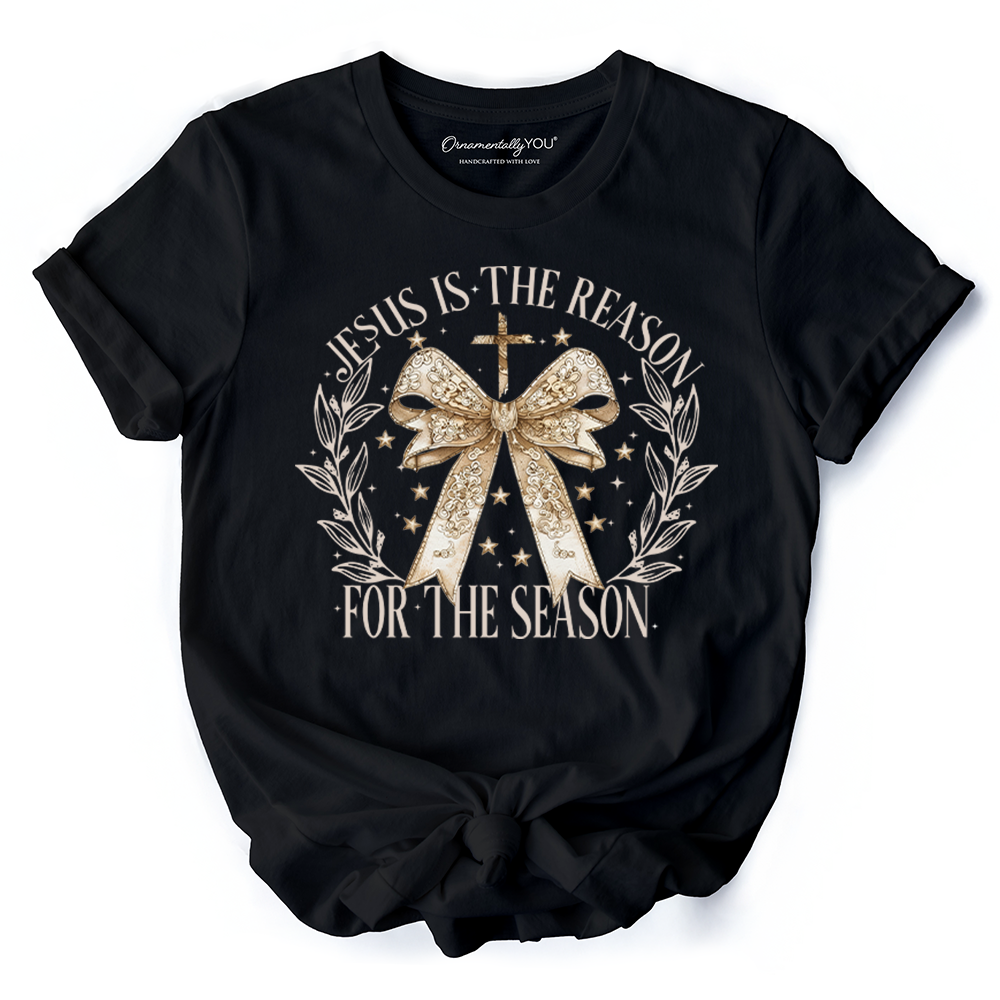 Jesus Is the Reason Christmas T‑Shirt, Coquette Gold Bow Cross Tee for Faithful Women