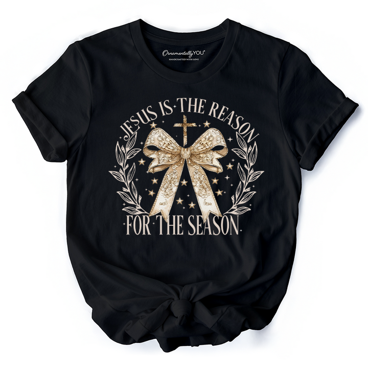 Jesus Is the Reason Christmas T‑Shirt, Coquette Gold Bow Cross Tee for Faithful Women
