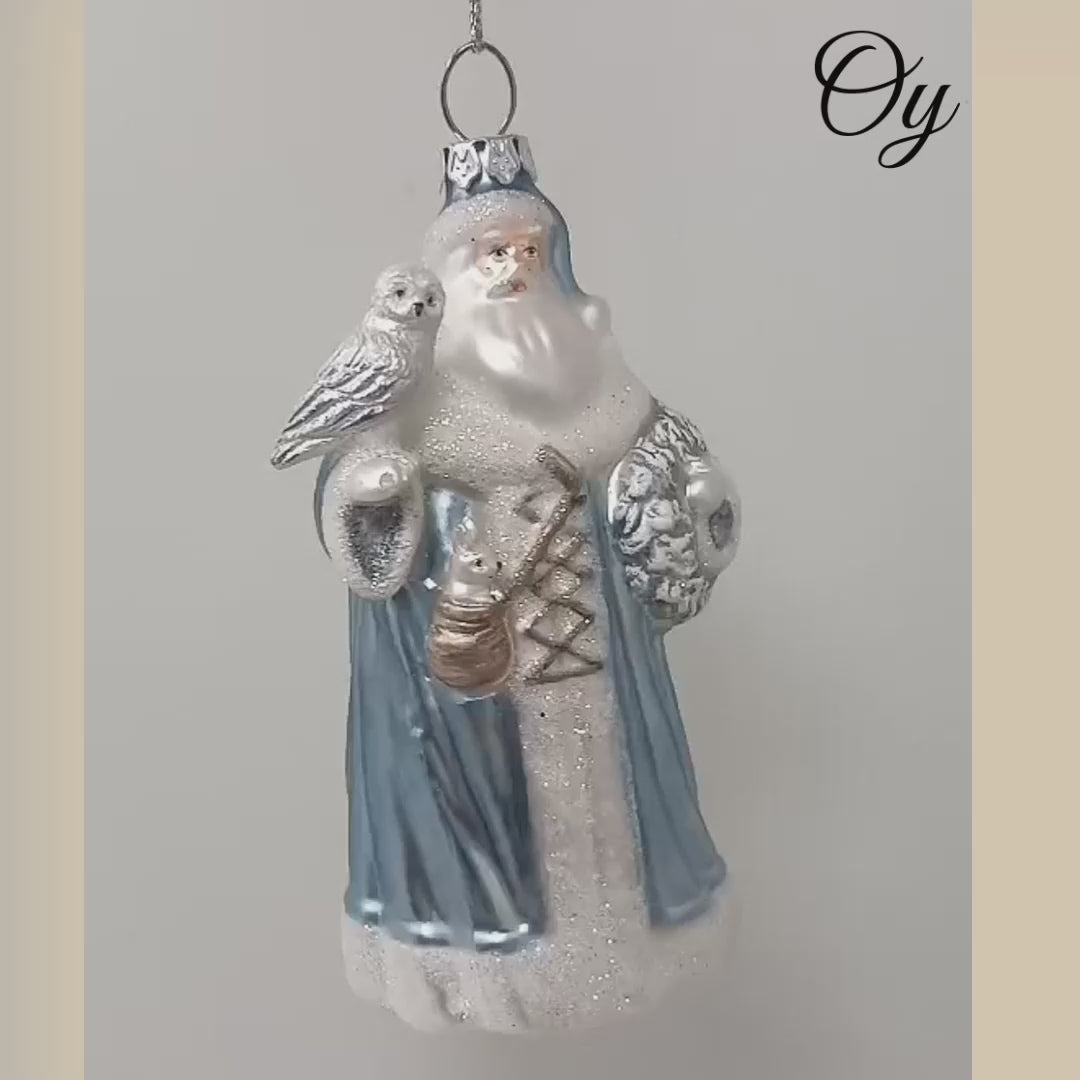 Arctic Whispers Santa Glass Christmas Ornament, Snowy Winter Theme with Light Blue Robe