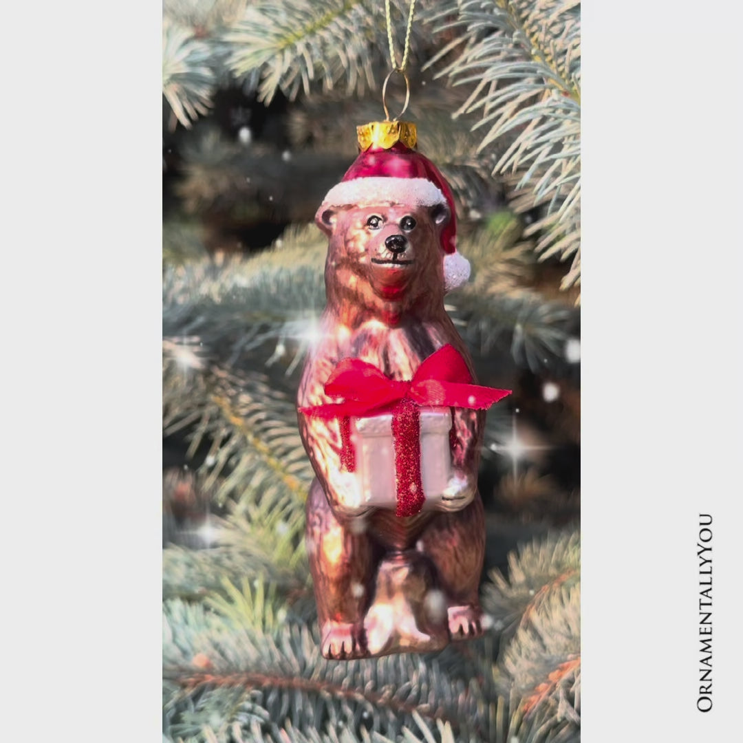 Grizzly Bear with Santa Hat and Gift Glass Christmas Ornament