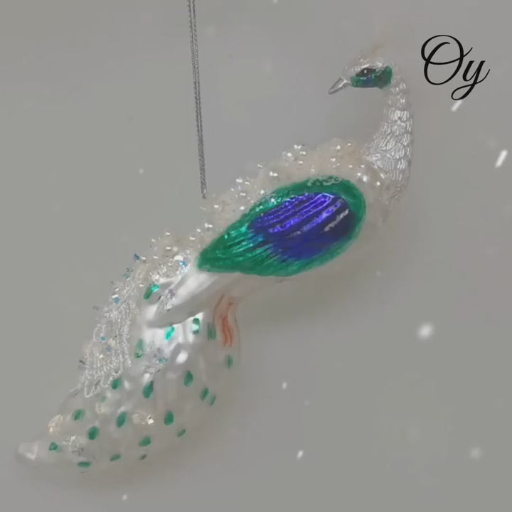 Elegant Winter Peacock Glass Christmas Ornament