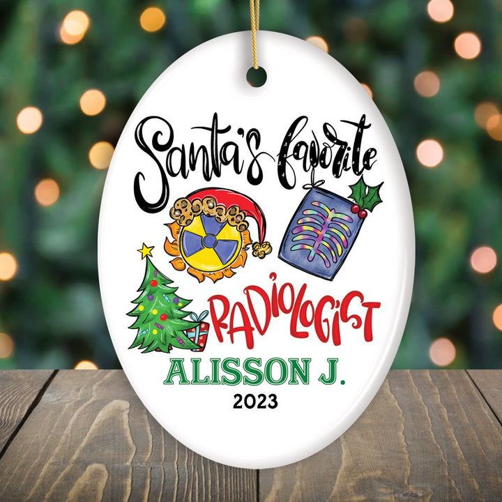 Santa’s Favorite Radiologist Personalized Christmas Ornament, Cute and Funny X-Ray Radiology Gift Ceramic Ornament OrnamentallyYou Oval 